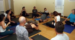 Group Meditating In Yoga Studio by Stocksy Contributor Milles Studio -  Stocksy